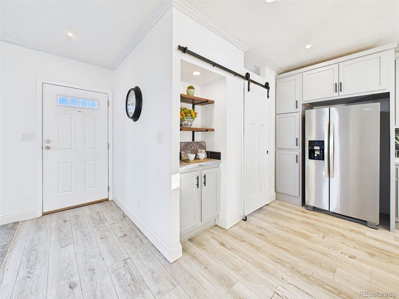 Bright, open living space with large picture windows, natural light—virtually staged to show layout potential. Bright, open living space with large picture windows, natural light—virtually staged to show layout potential.