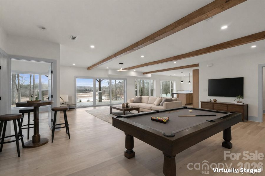 Virtually Staged Second Living and Entertainment Space in Basement