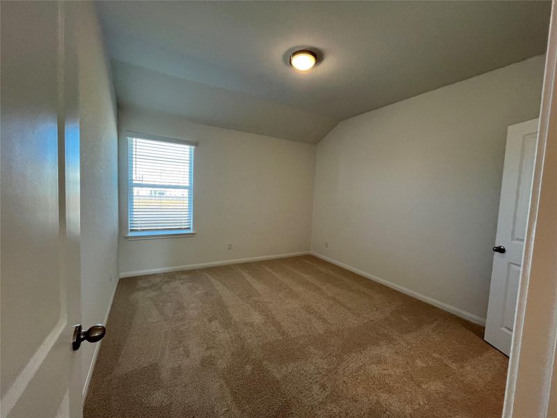 Spacious upstairs bedroom. Both bedrooms upstairs are large and include walk in closets. For demonstration purposes only. This will be the same interior layout. Colors can vary.