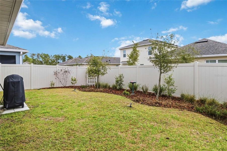 Exterior details and patio area of a home in Harmony West, St. Cloud (Image 26).