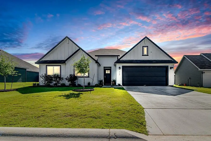 Front exterior of a new home in , Fredericksburg, TX, highlighting curb appeal (Image 2). Front exterior of a new home in , Fredericksburg, TX, highlighting curb appeal (Image 2).