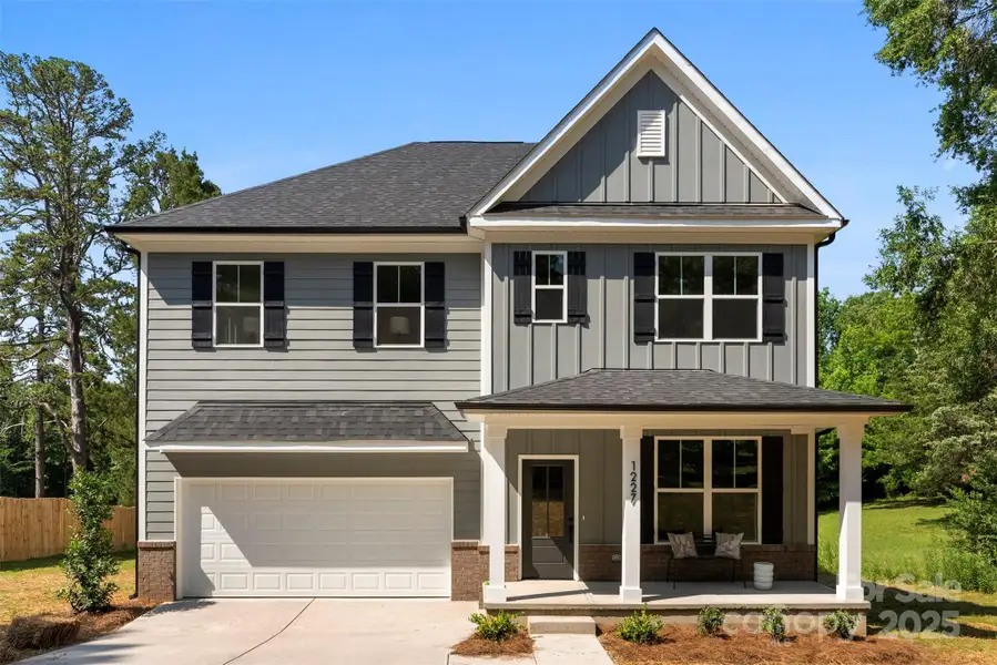 Front exterior of a new home in , Charlotte, NC, highlighting curb appeal (Image 2).