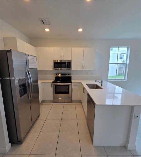 Furnished interior view inside a new home in , Coral Springs (Image 5).