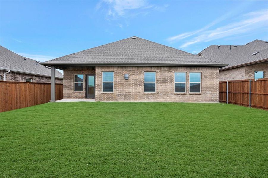 Exterior details and patio area of a home in Aspire at Reunion, Newark (Image 22).