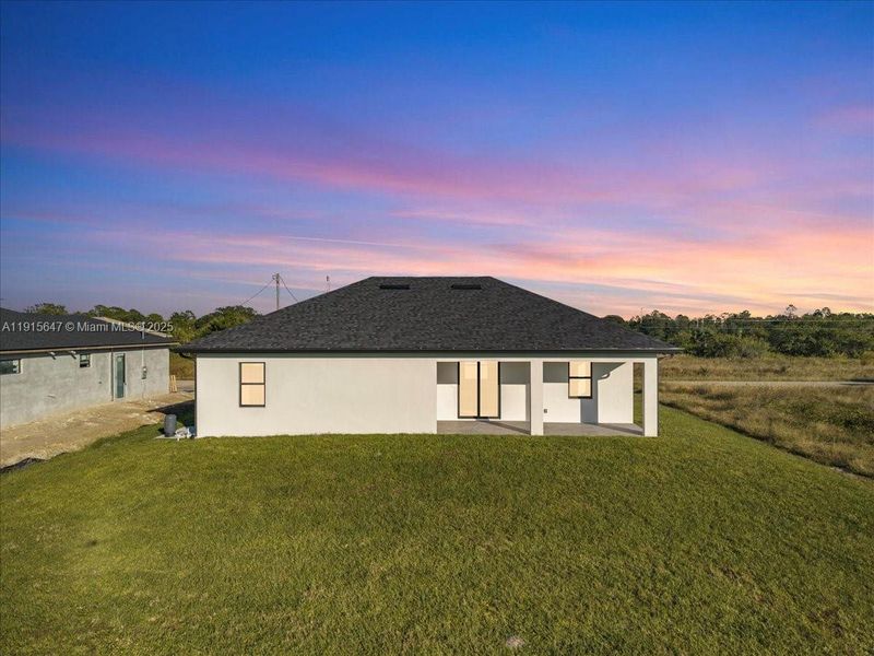 Exterior details and patio area of a home in , Lehigh Acres (Image 4). Exterior details and patio area of a home in , Lehigh Acres (Image 4).