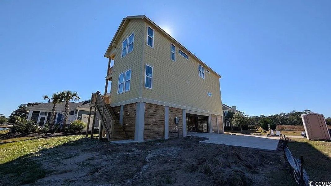 Exterior details and patio area of a home in Charleston Landing, North Myrtle Beach (Image 3).
