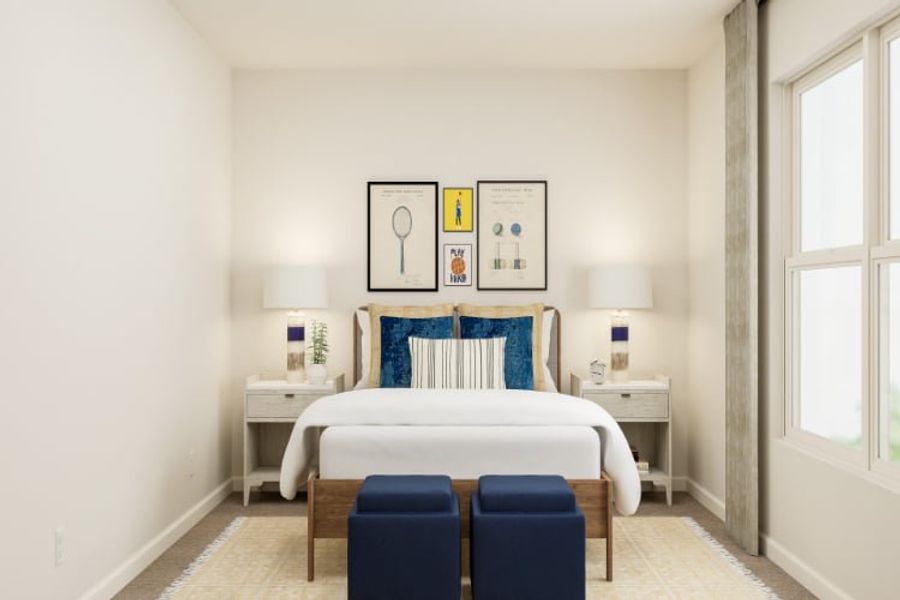 A room with a bed and chairs. A room with a bed and chairs.