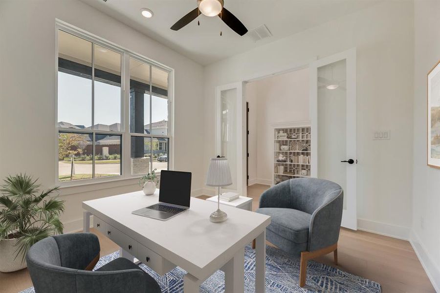 Office space with wood finished floors, recessed lighting, and a ceiling fan Office space with wood finished floors, recessed lighting, and a ceiling fan