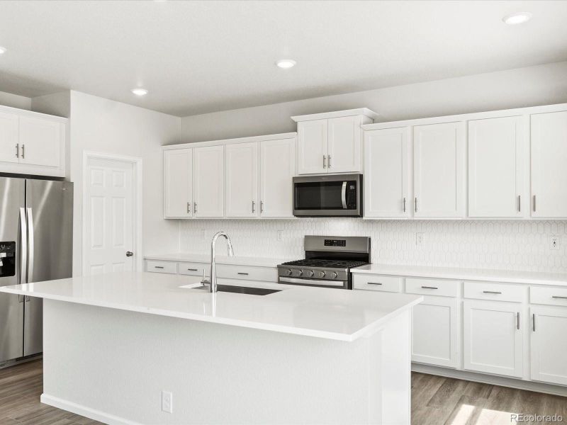 Furnished interior view inside a new home in Poudre Heights: The Alpine Collection, Windsor (Image 16).