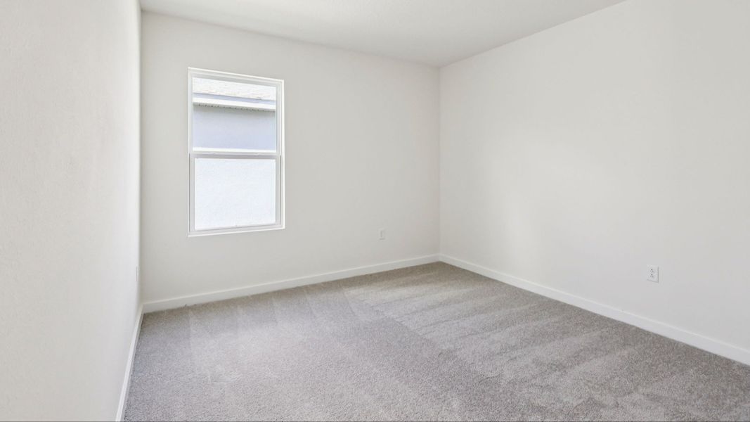 Bedroom in the Baker by DRB Homes in Willowbrook North