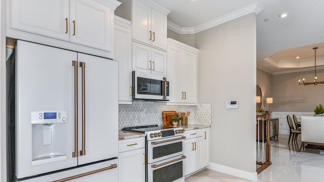Furnished interior view inside a new home in Esplanade by the Islands Coach Homes, Naples (Image 8).