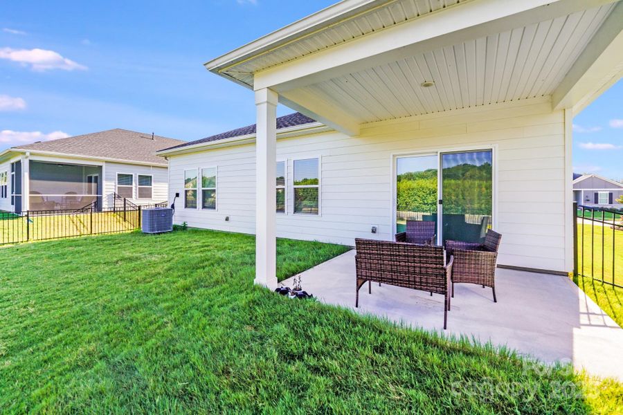 Front exterior of a new home in Simpson Farms, Monroe, NC, highlighting curb appeal (Image 21). Front exterior of a new home in Simpson Farms, Monroe, NC, highlighting curb appeal (Image 21).