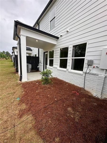 Exterior details and patio area of a home in Terrace at Riverview Landing, Smyrna (Image 14).