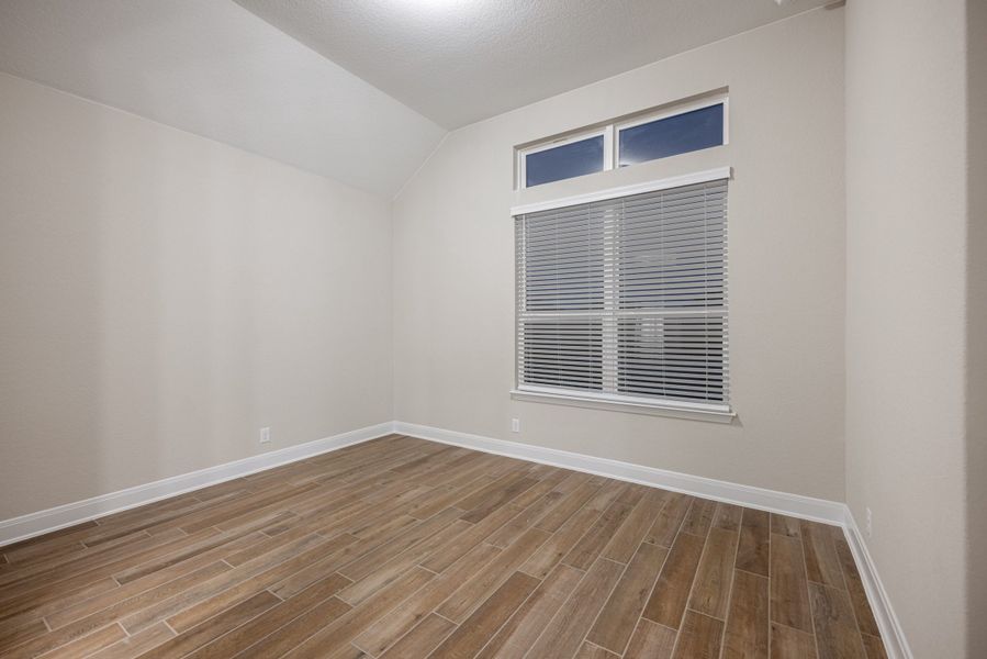 Representative unfurnished interior of a home built from the Mackenzie by Chesmar Homes in Sienna Lakes, San Antonio (Image 25).