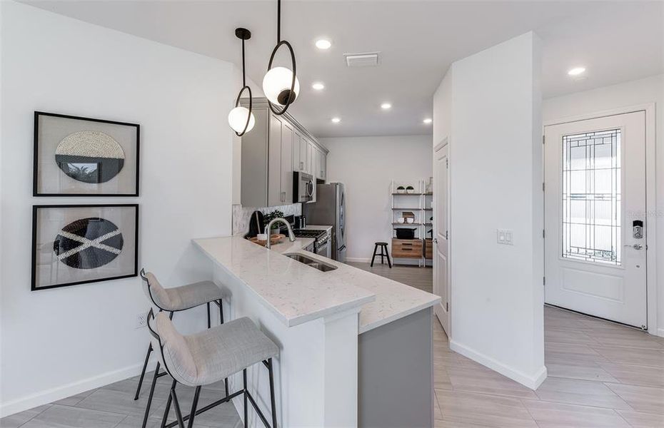 Furnished interior view inside a new home in BeachWalk by Manasota Key, Englewood (Image 5).