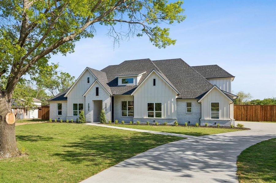 Front exterior of a new home in , Rowlett, TX, highlighting curb appeal (Image 21). Front exterior of a new home in , Rowlett, TX, highlighting curb appeal (Image 21).