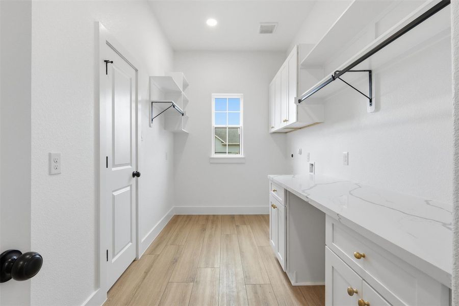 Photos are of prior LOTUS plan homesite built by Aurcova. Photos are of prior LOTUS plan homesite built by Aurcova.