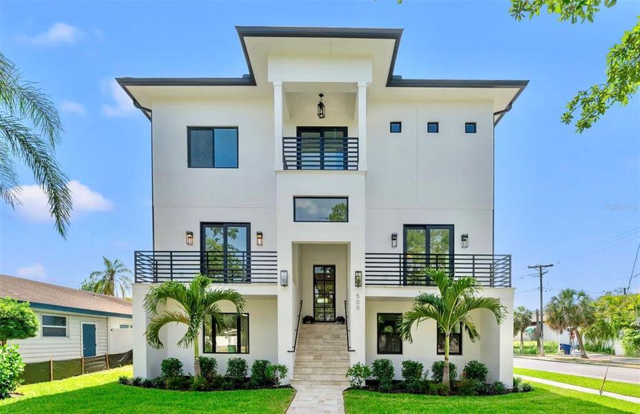 Front exterior of a new home in , Tampa, FL, highlighting curb appeal (Image 22).