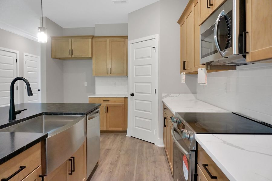 Representative furnished interior of a home built from the Anderson by Parkside Builders in Givens Park, Chattanooga (Image 18).
