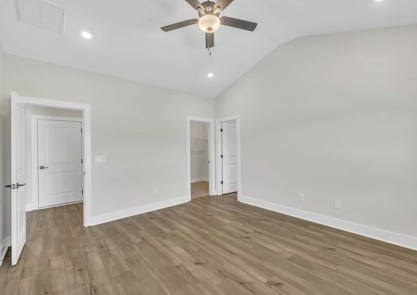 The master bedroom has ample space for your king-sized furniture.