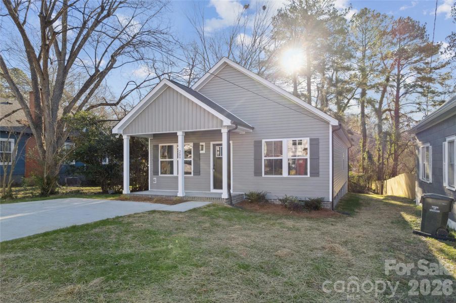 Front exterior of a new home in , Spencer, NC, highlighting curb appeal (Image 21).