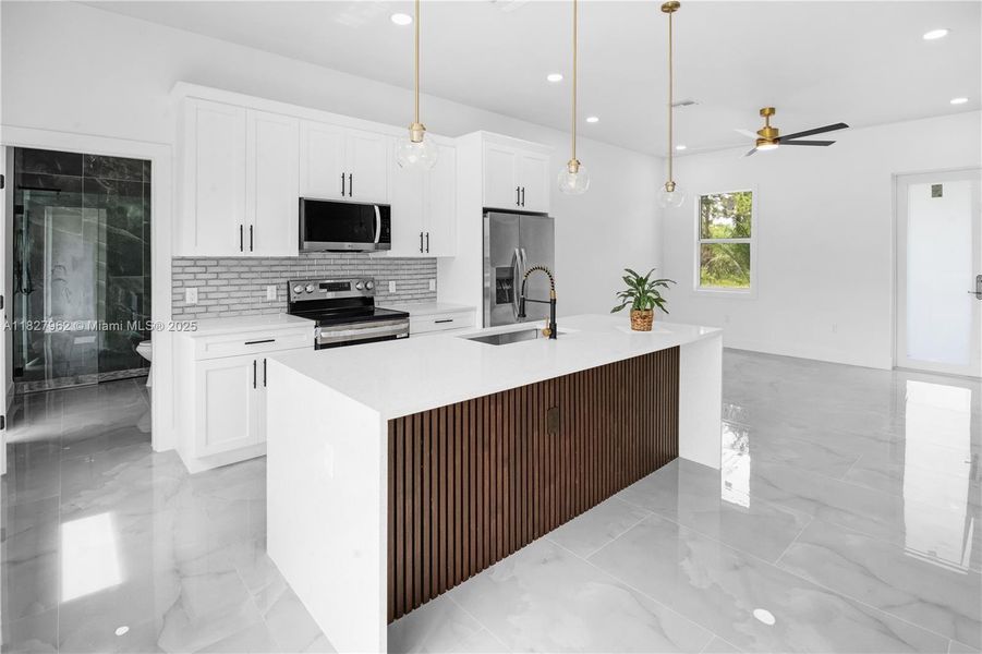 Furnished interior view inside a new home in , Lehigh Acres (Image 3). Furnished interior view inside a new home in , Lehigh Acres (Image 3).