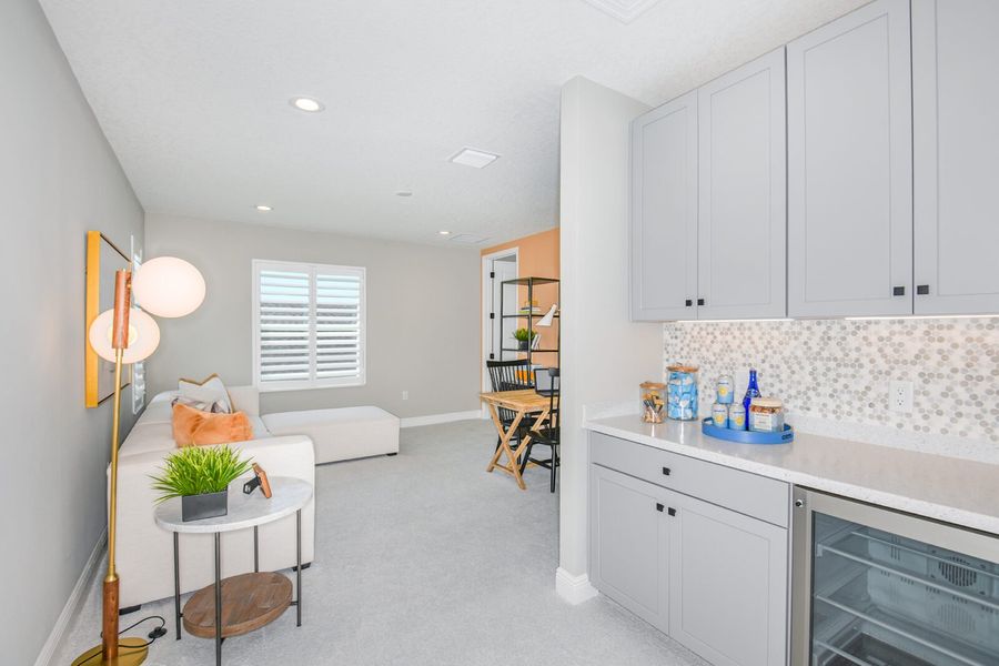 Furnished interior view inside a new home in Grand Park, Sarasota (Image 32).