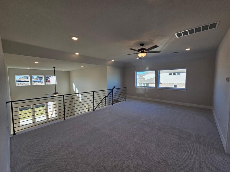 Spacious, unfurnished interior of a new home in Blackhawk in Pflugerville, Pflugerville (Image 19).