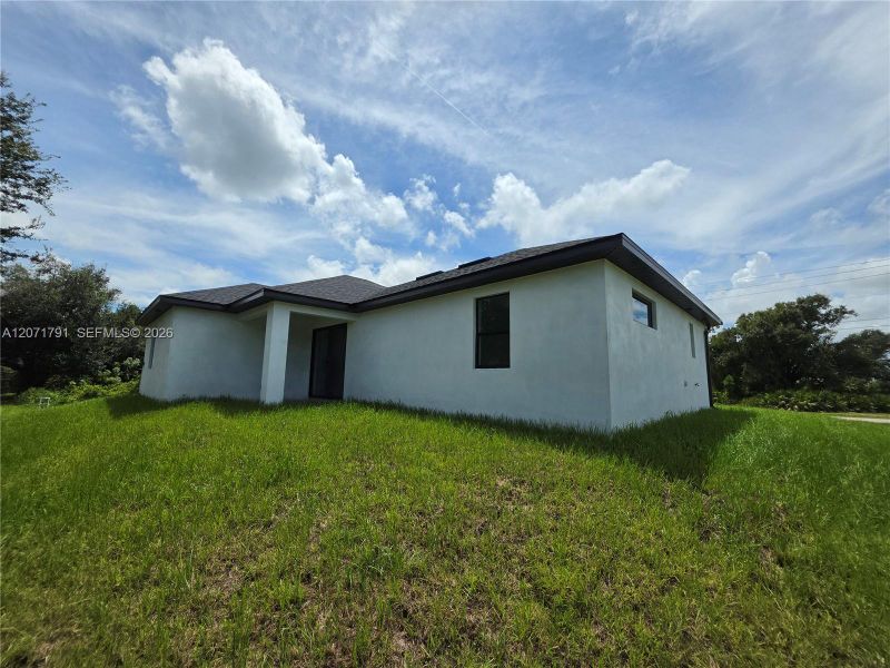 Exterior details and patio area of a home in , Lehigh Acres (Image 22).