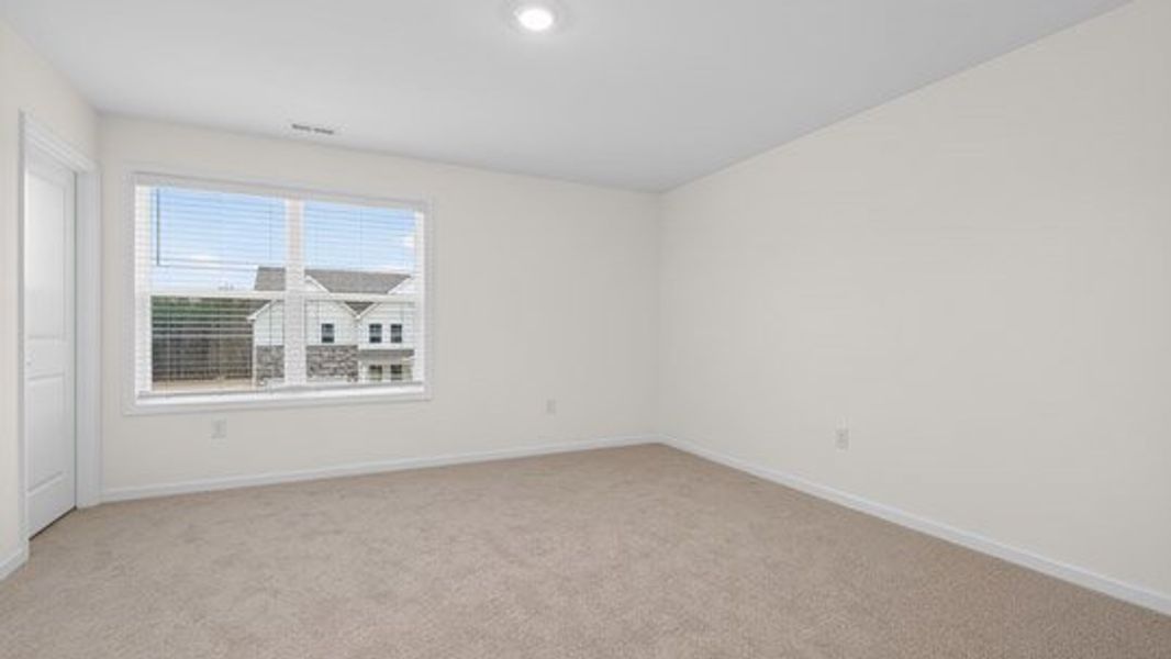 Representative unfurnished interior of a home built from the Tillery by D.R. Horton in The Estates Park, Apex (Image 37).