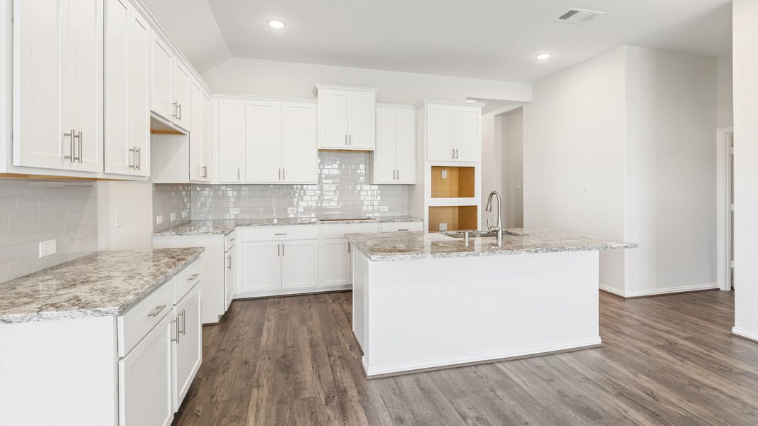 Furnished interior view inside a new home in Sunterra, Katy (Image 18).