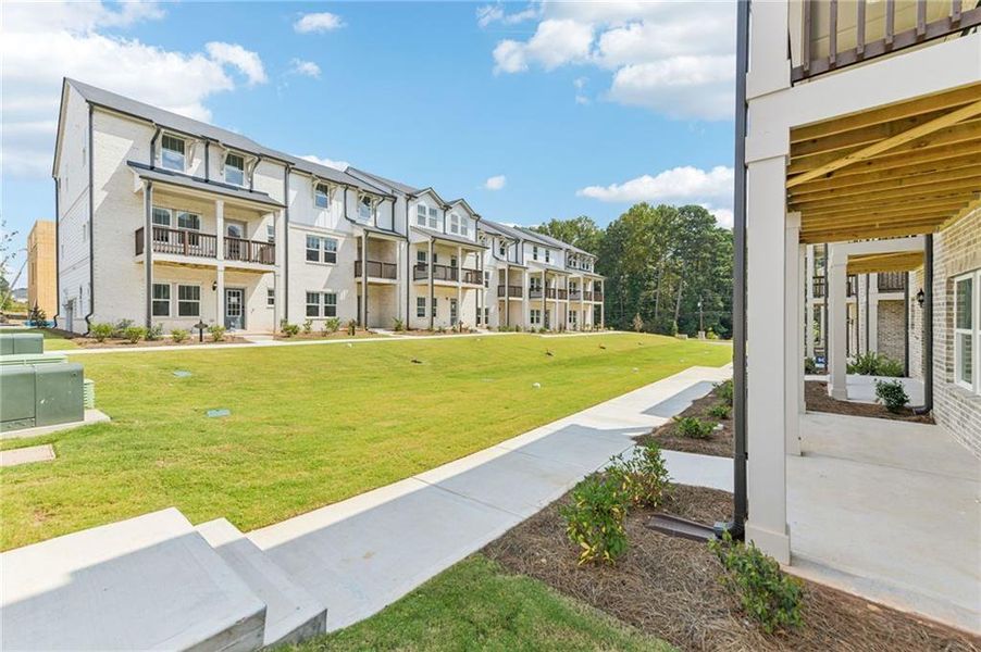 Exterior details and patio area of a home in Martin Springs - Highland Series, Lawrenceville (Image 3).