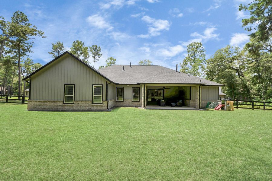 Front exterior of a new home in , Magnolia, TX, highlighting curb appeal (Image 20).