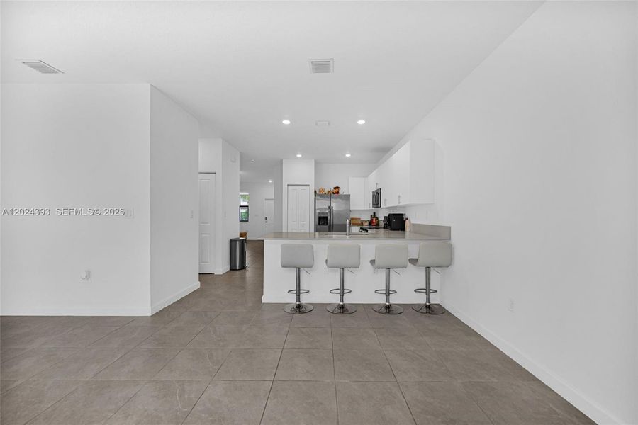 Furnished interior view inside a new home in , Miami (Image 16). Furnished interior view inside a new home in , Miami (Image 16).