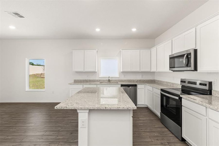 Furnished interior view inside a new home in Peach Crossings, Winter Haven (Image 6).