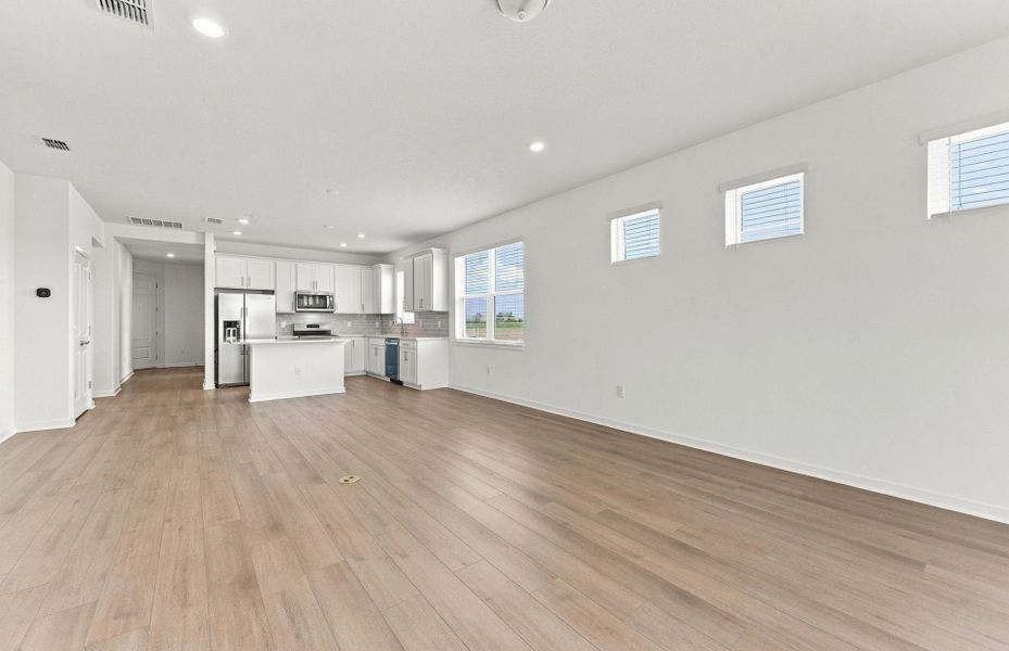Spacious, unfurnished interior of a new home in Explore North River Ranch, Parrish (Image 13).