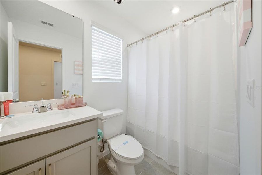 Furnished interior view inside a new home in Solara Resort, Kissimmee (Image 26).