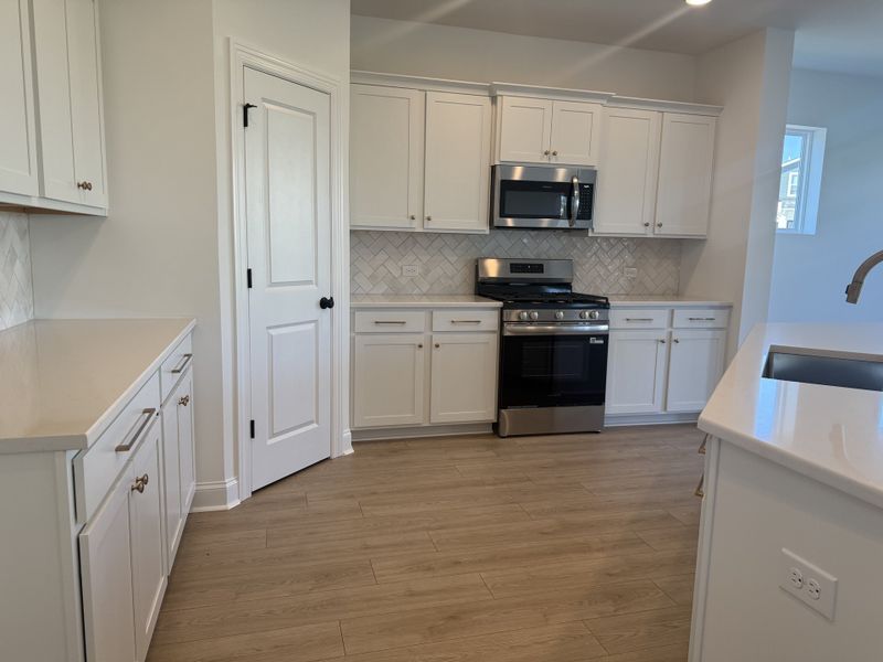 Furnished interior view inside a new home in Nexus – Park Collection, Gallatin (Image 9).