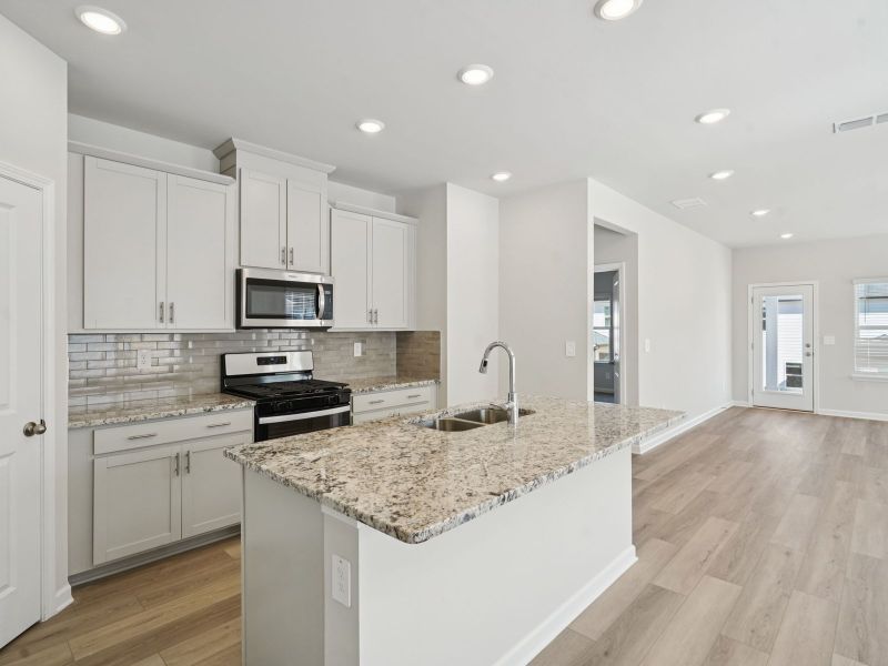 Furnished interior view inside a new home in Avalon - Reserve Series, Conyers (Image 5).