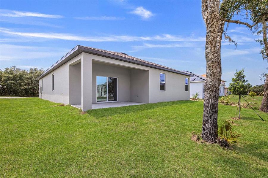 Exterior details and patio area of a home in Poinciana, Poinciana (Image 3).
