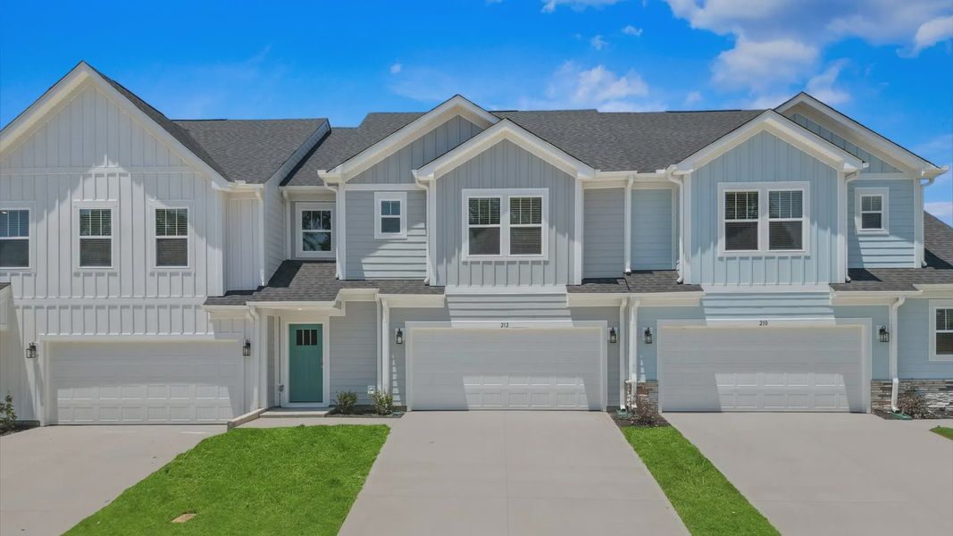 Front exterior of a new home in Village at Midway, Anderson, SC, highlighting curb appeal (Image 1).