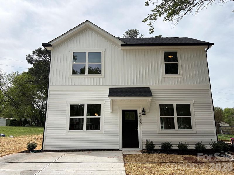 Front exterior of a new home in , Bessemer City, NC, highlighting curb appeal (Image 1). Front exterior of a new home in , Bessemer City, NC, highlighting curb appeal (Image 1).