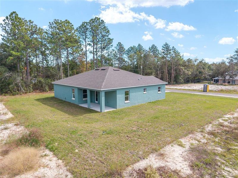Exterior details and patio area of a home in , Citrus Springs (Image 26).