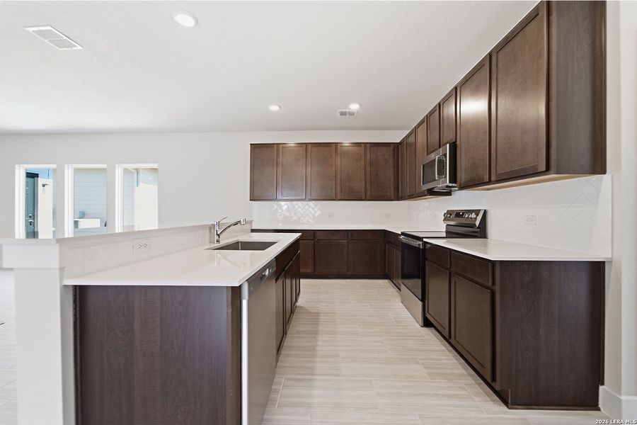 Furnished interior view inside a new home in Swenson Heights, Seguin (Image 7).
