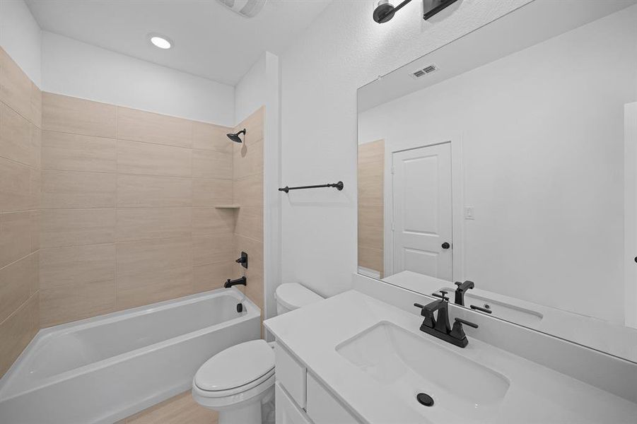 Full bathroom featuring  shower combination and vanity