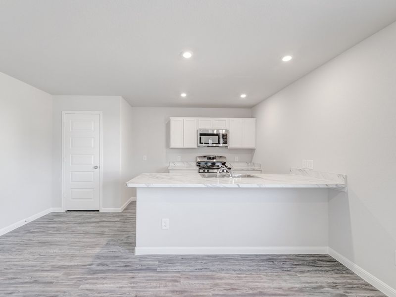 Furnished interior view inside a new home in Madalynn Estates, Corpus Christi (Image 7). Furnished interior view inside a new home in Madalynn Estates, Corpus Christi (Image 7).