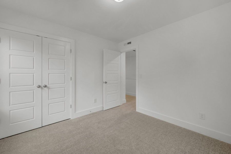 Spacious, unfurnished interior of a new home in Ashmore Townes, Garner (Image 18). Spacious, unfurnished interior of a new home in Ashmore Townes, Garner (Image 18).