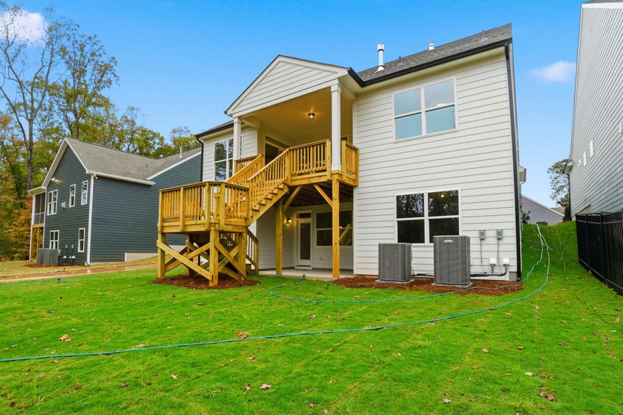 Exterior details and patio area of a home in Villas at Prestwick, Mooresville (Image 21).