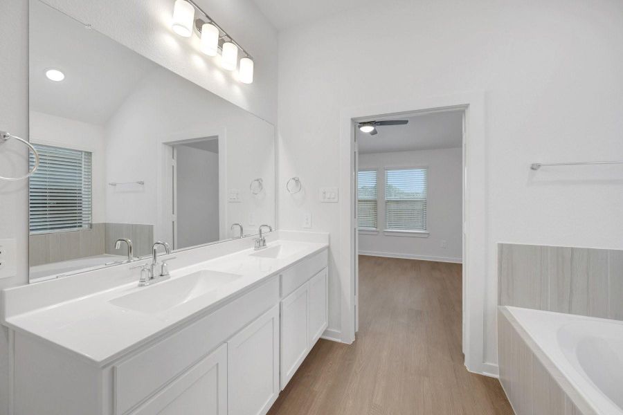 Furnished interior view inside a new home in Lone Star Landing, Montgomery (Image 14).