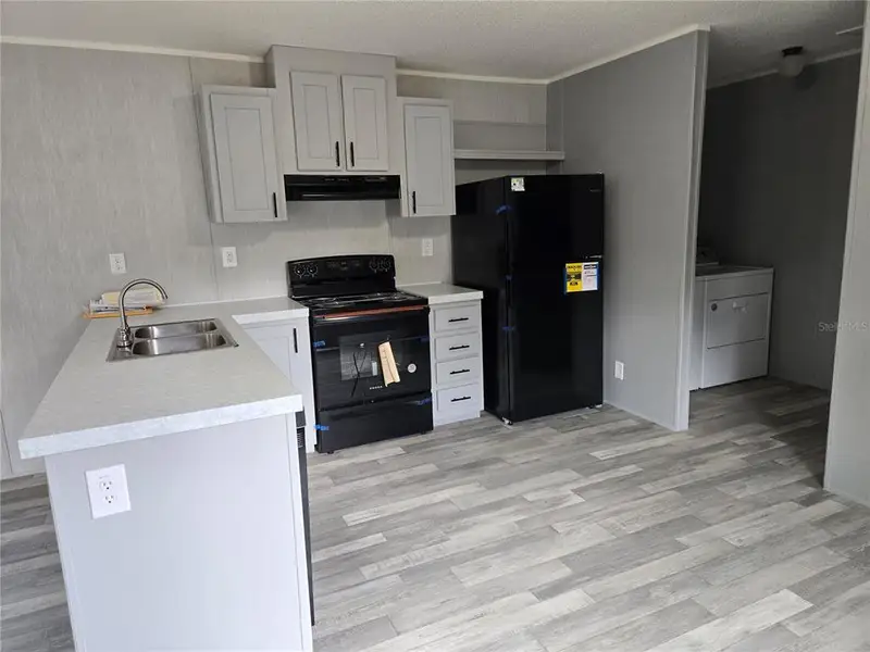Furnished interior view inside a new home in , Bronson (Image 4).